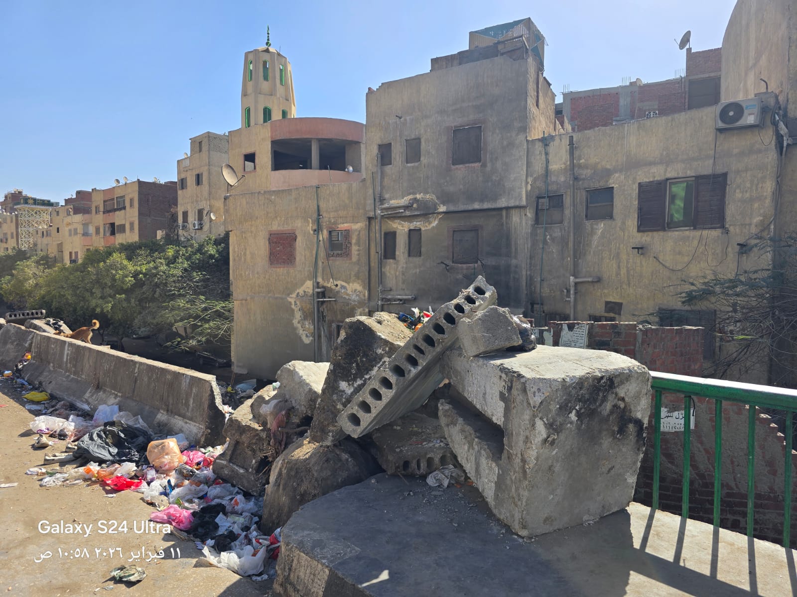 رفع الكتل الخرسانية وفتح سلم مشاه مدينة النور بحي الهرم (3)