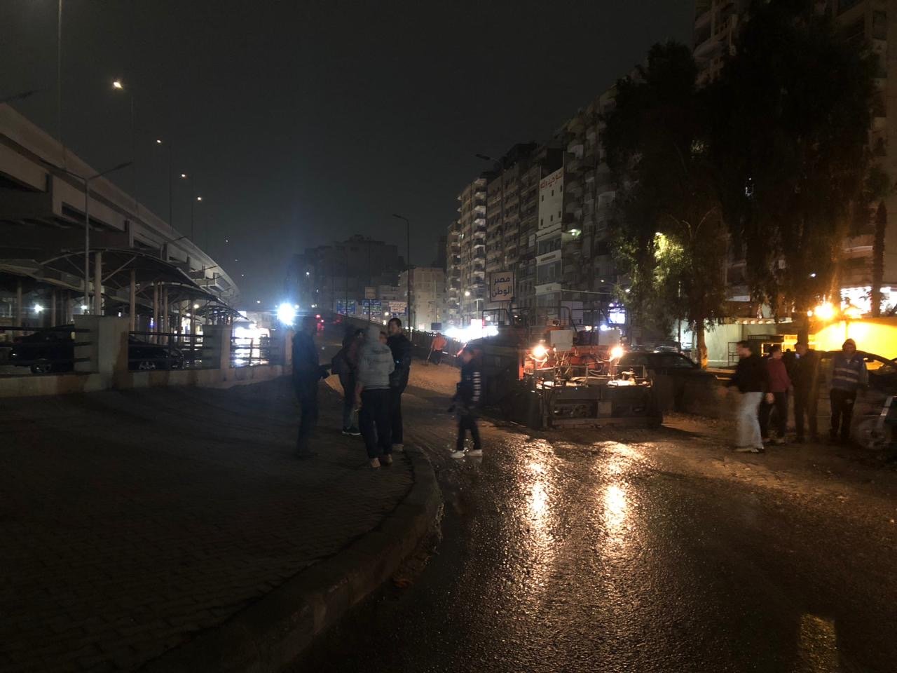 جانب من أعمال رصف مطلع كوبرى أرض اللواء