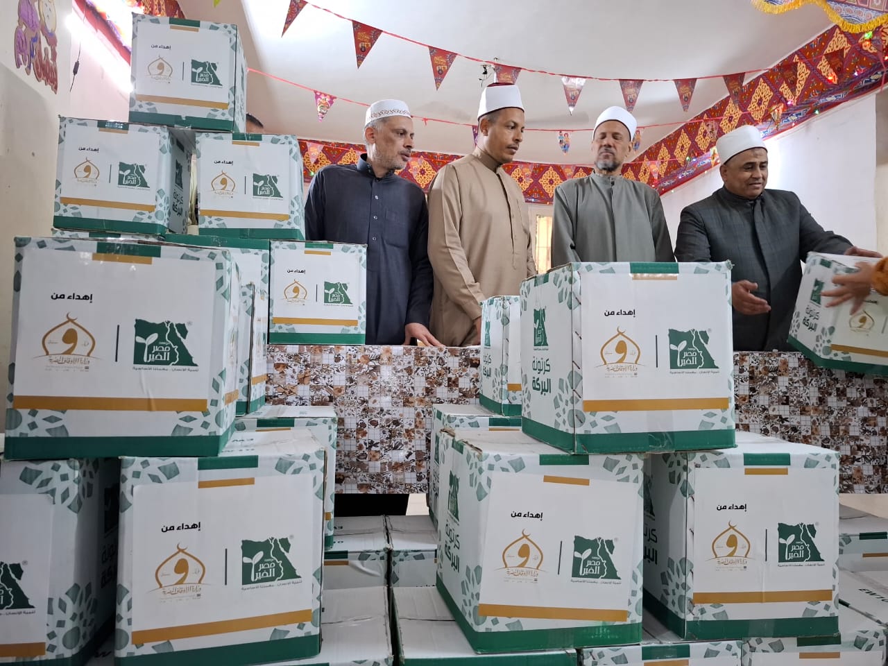 الأوقاف ومصر الخير توزعان 100 ألف كرتونة غذائية بمناسبة شهر رمضان بمحافظات الجمهورية (11)