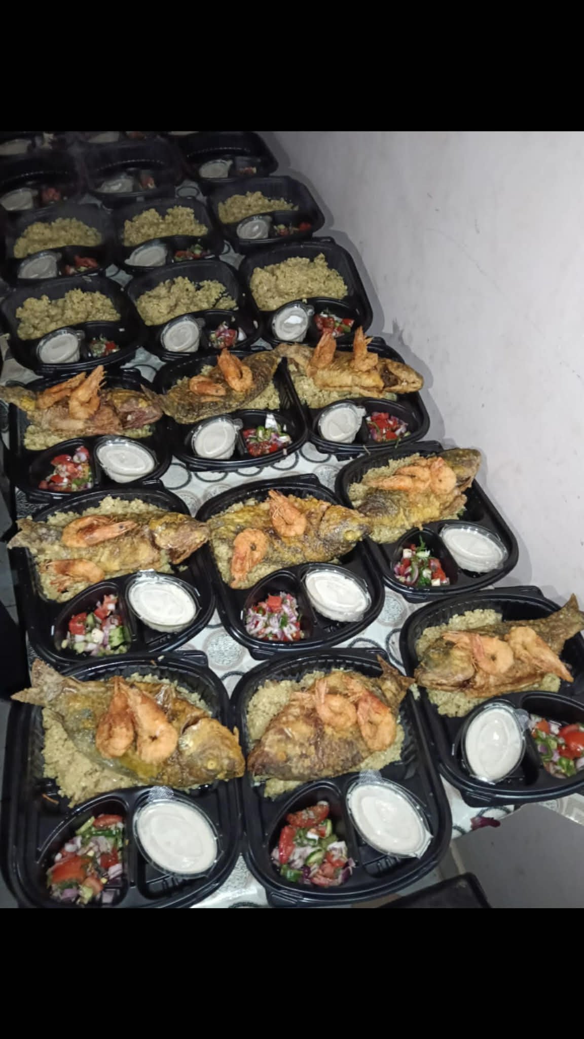 جانب من تحضير الوجبات لإفطار الصائمين (3)