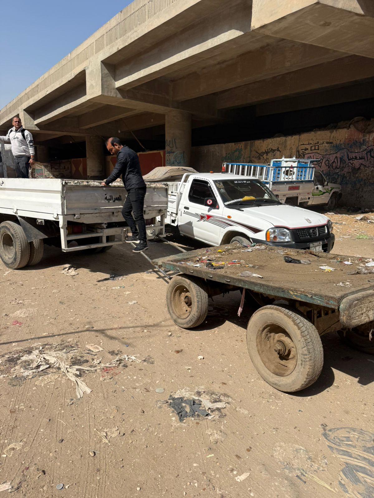 التحفظ على 57 عربة كارو وتروسيكل خلال حملات على النباشين والفريزة فى الجيزة (6)