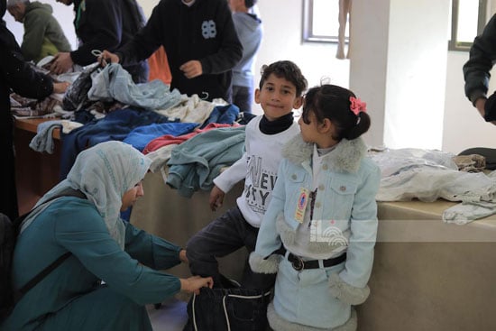 فرحة أطفال أيتام بلبس العيد فرحة أطفال أيتام بلبس العيد