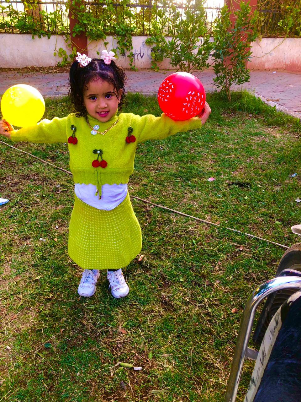 فرحة طفلة بالعيد فى مراكز شباب الأقصر