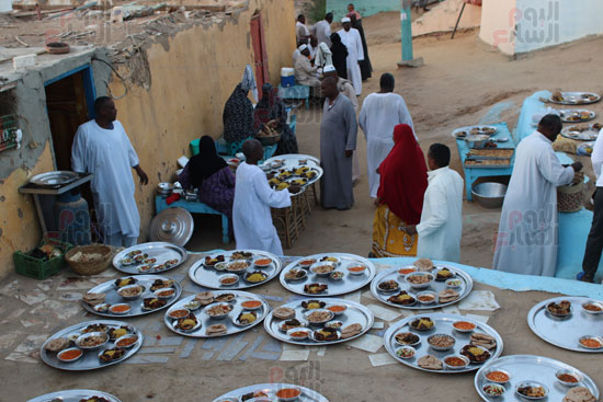 أهل-النوبة-يجهزون-للإفطار-الجماعى