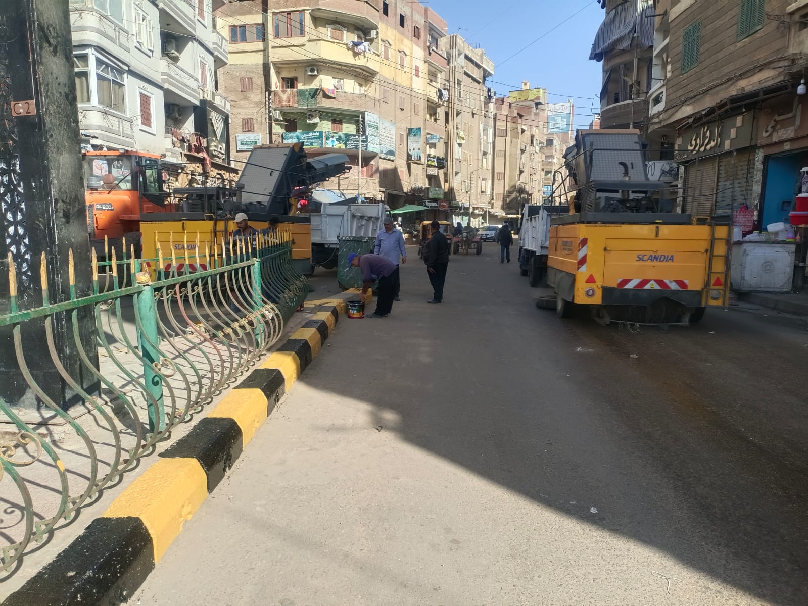كنس الشوارع ورفع الاتربة