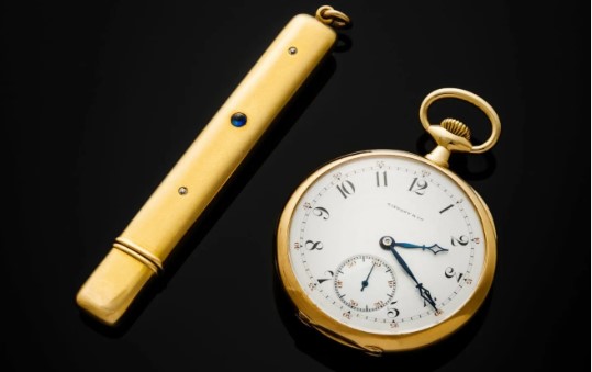 ساعة وقلم رصاص ذهبى 