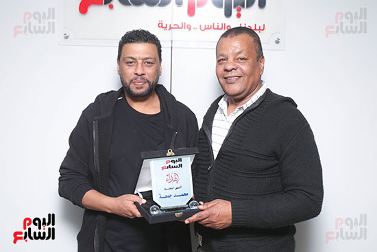 محمد جمعة والزميل عادل عبد الله