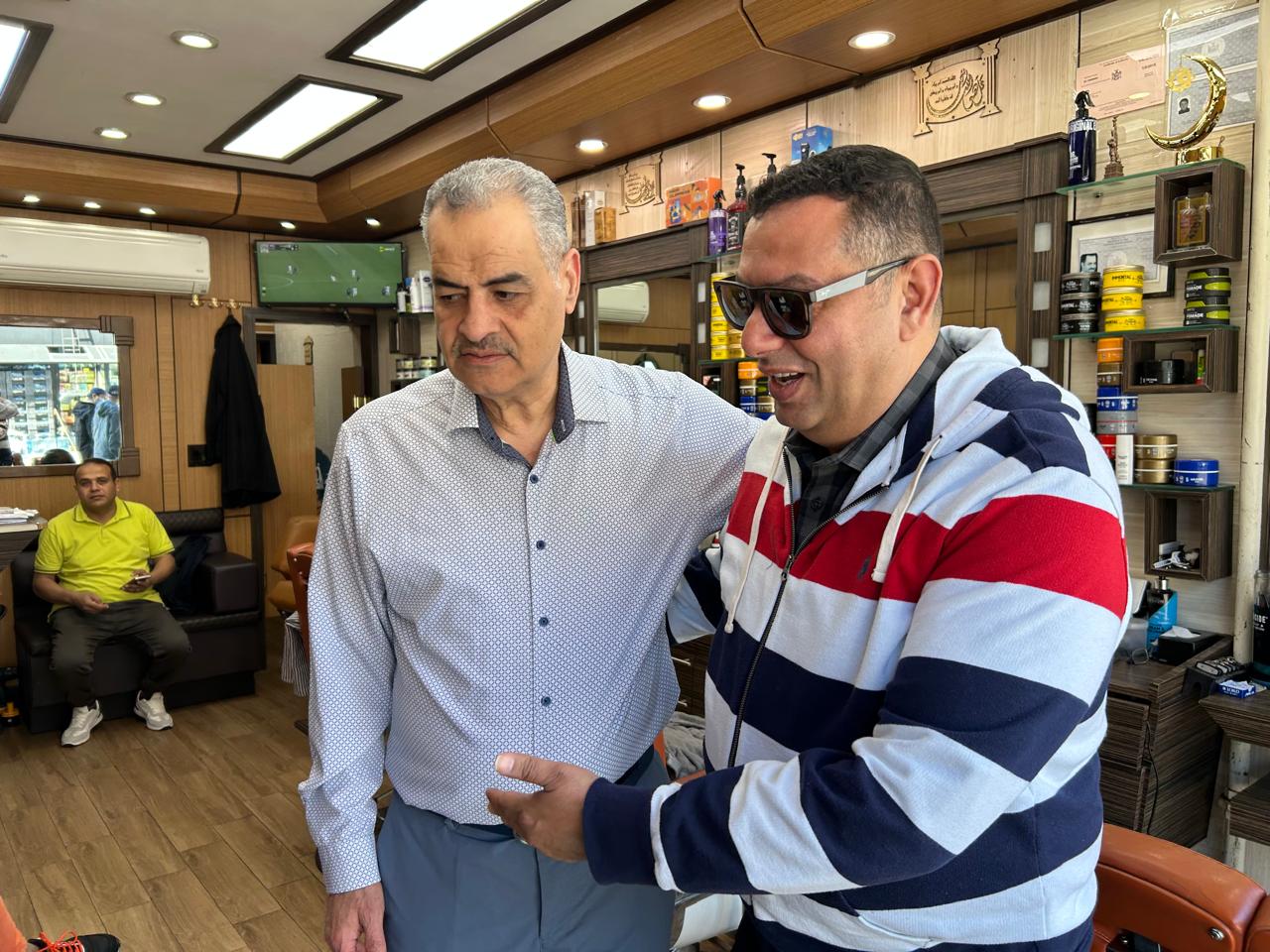نشأت زنفل مع احد المصريين