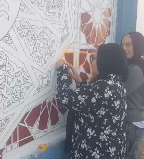 المشاركة في رسم الجدارية