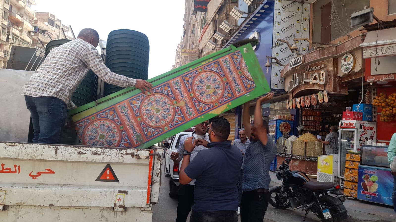 رفع إشغالات المحال والمقاهي في الطالبية (5)