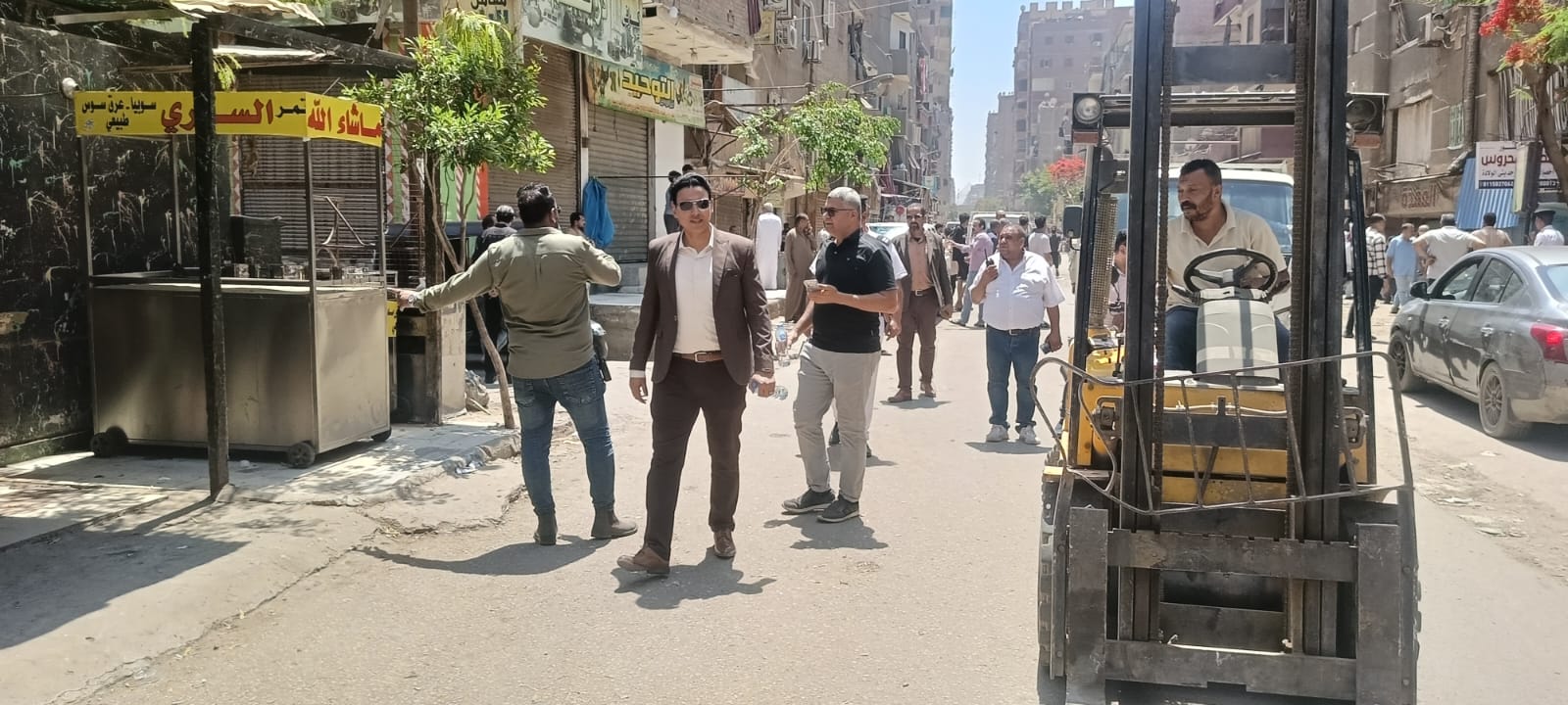 حملة مكبرة بالطالبية لرفع الإشغالات وإزالة التندات والبروزات المخالفة