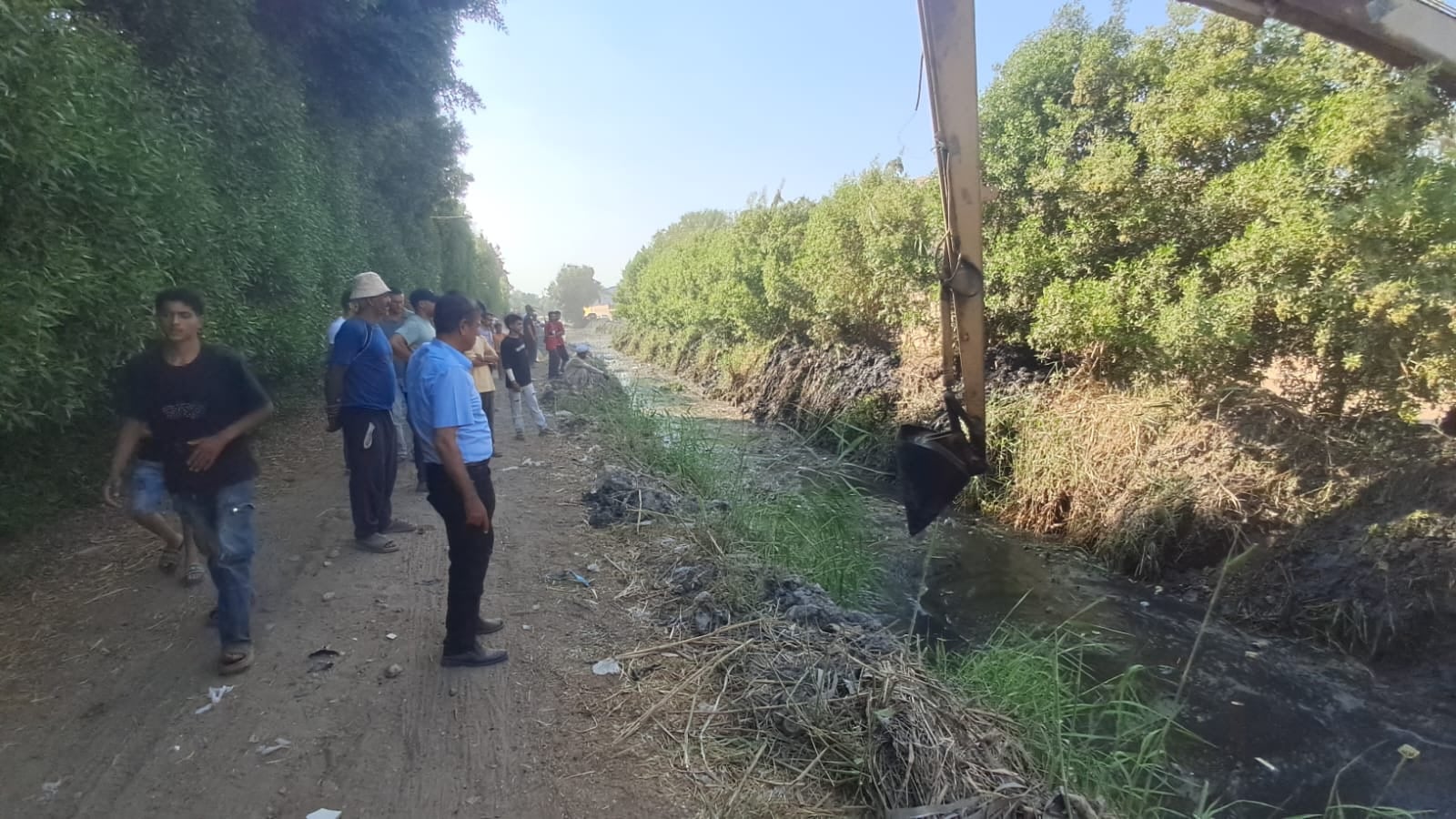 الجيزة تواصل تمشيط مصرف الجنينة لت