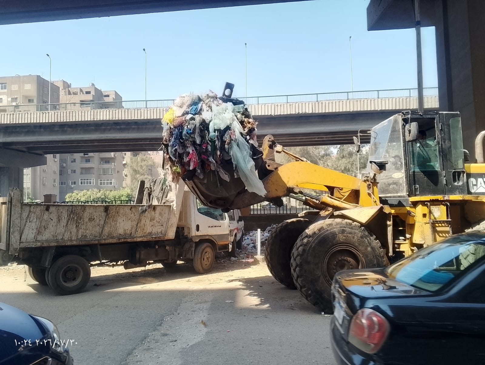 رفع تجمعات القمامة بشارع ترعة المريوطية