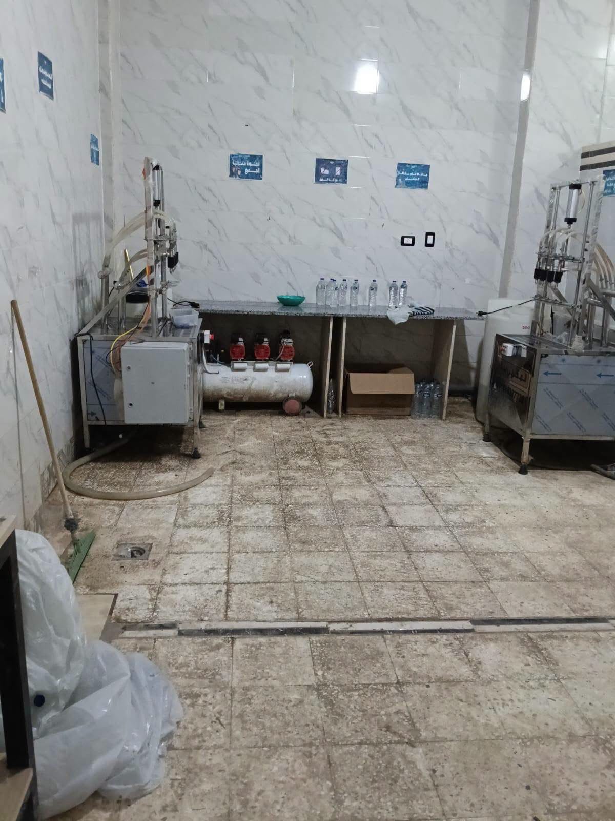 ضبط محطة تعبئ المياه بعلامة تجارية وهمية (4)