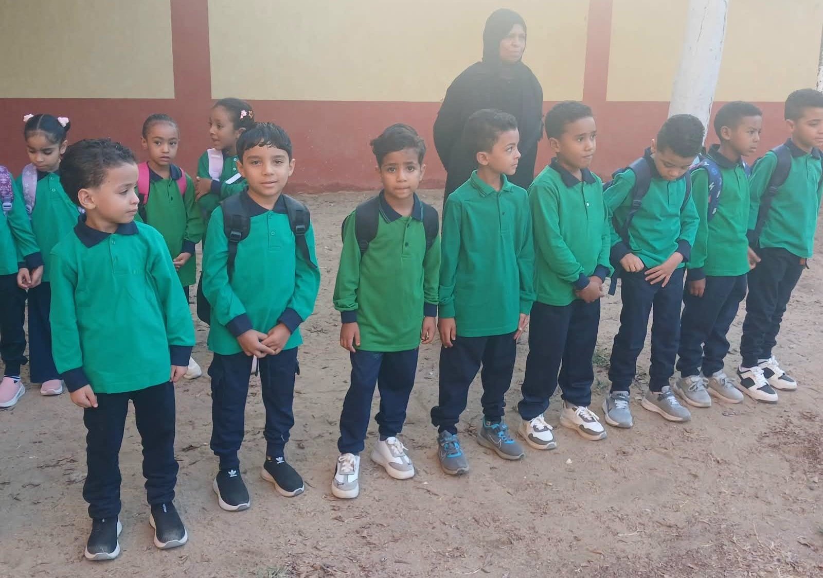 الأطفال فى طوابير الصباح مع بداية العام الدراسي الجديد