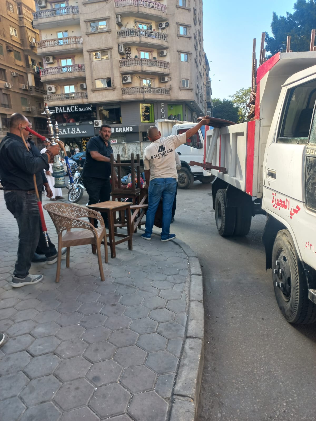 حملة بحي العجوزة لرفع إشغالات المحلات (2)