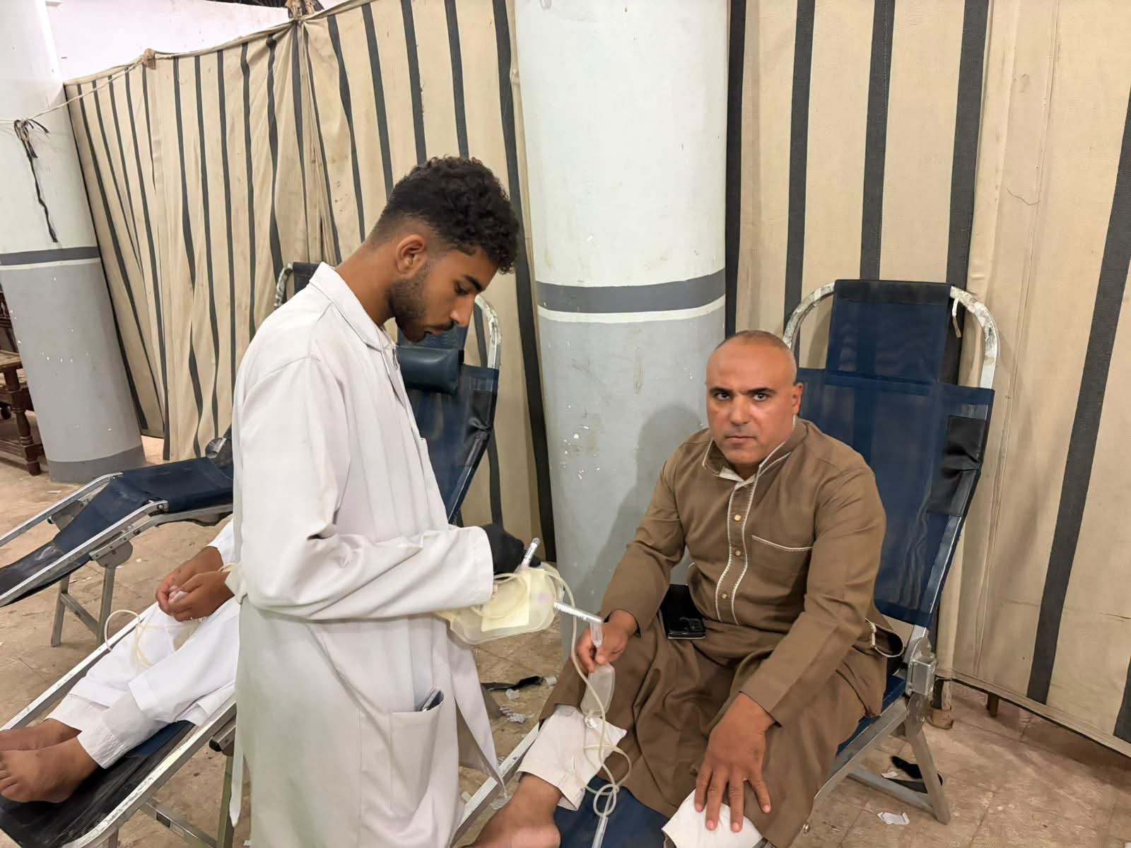جانب من التبرع بالدم جانب من التبرع بالدم