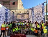 جانب من العاملين بالمشروع 