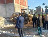 تنفيذ إزالات لمبان بدون ترخيص ومتغيرات غير قانونية بأسيوط