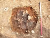 رفات جثث محروقة