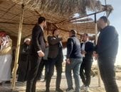 مسئولو الصحة أمام مضمار سباق الهجن