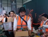 أعمال تجهيز وتعبئة كراتين المواد الغذائية للأسر الأولى بالرعاية