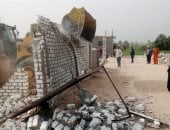 الحملات تزيل تعدٍ بالبناء في المهد