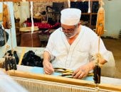 العم حمزة سيد أثناء العمل