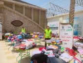 تنظيم سلسلة معارض لتوزيع الملابس الجديدة