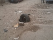 قارئ "اليوم السابع" يرسل صورا لبالوعة بدون غطاء بشارع زغلول فى الهرم