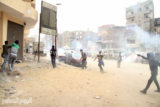مواجهات بين أنصار الإخوان والشرطة أثناء محاولة تفريقهم