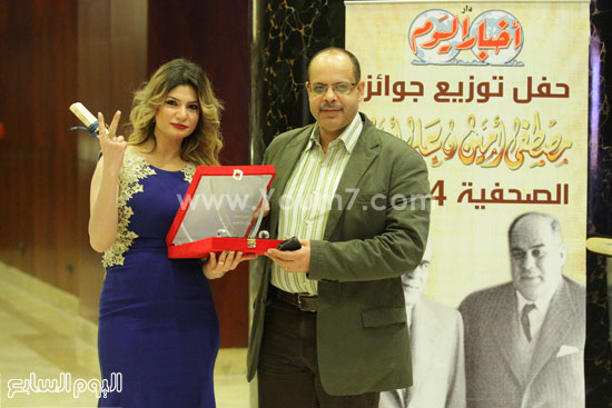 أكرم القصاص رئيس التحرير التنفيذى لليوم السابع مع إيمان حنا سكرتير التحرير