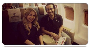 رزان تنشر صورتها مع أحمد حلمى على متن طائرة
