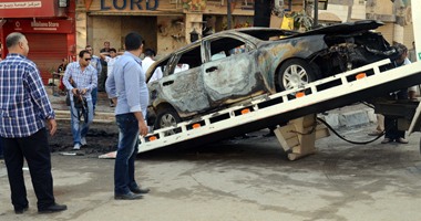 عناصر الإخوان يحرقون سيارة ملاكى فى منطقة المطبعة بفيصل