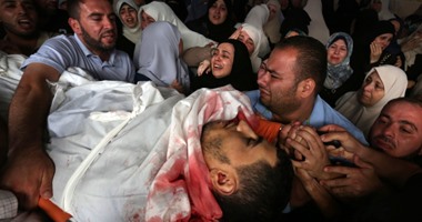 ‬الفلسطينيون ينظمون مسيرة لمطالبة إسرائيل بتسلم جثث شهدائهم