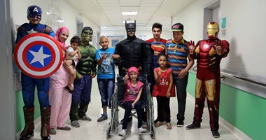 بالصور.. الخارقون المصريون يقدمون جرعة أمل وسعادة لأطفال 57357
