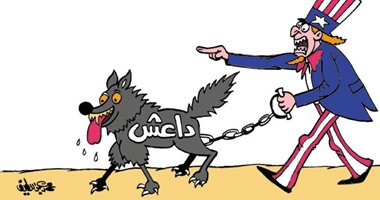 "داعش".. كلب أمريكا المسعور.. فى كاريكاتير "اليوم السابع"