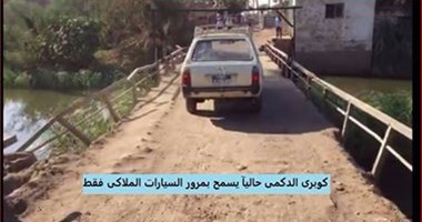 بالصور.. "مرور الجيزة" يغلق كوبرى الدكمى بالبدرشين أمام سيارات النقل