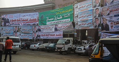 بالصور.. لافتات الدعاية لمرشحى البرلمان تكسو الأبنية الأثرية بالقاهرة
