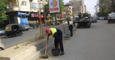بالصور.. الجيزة تبدأ حملة لنظافة شارع ترسا بالعمرانية ووضع 14 صندوق قمامة