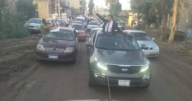 بالصور.. مسيرة بالسيارات لدعم مرشح بمركز المحلة