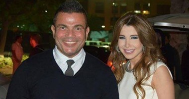 نانسى عجرم تنشر صورة لها مع عمرو دياب وتعلق: "عظيم أن تتقاسم حفلة معه"