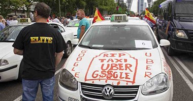 تطبيق "أوبر" للسيارات الخاصة يهدد "التاكسى الأبيض" بمصر