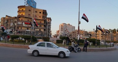 بالصور..ميدان النصر بكفر الشيخ يكتسى بالأعلام قبل وصول جثامين الشهداء