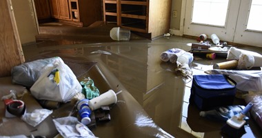 بالصور.. مياه الأمطار تتلف محتويات عدد من المنازل فى ولاية ميزورى بأمريكا