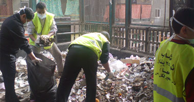 بالصور.. شباب 25 يناير ينظمون حملات لتنظيف شوارع إمبابة