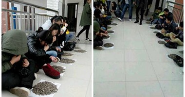 بالصور.. مدرس صينى يعاقب طلابه بتناول 50 كيلو من اللب