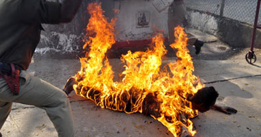 فرد أمن يشعل النيران فى جسده بعد خصم يوم من راتبه بالجيزة