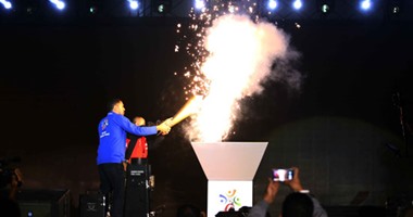 منعم محمد يحمل شعلة الأولمبياد الخاص