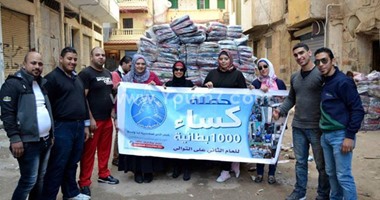 بالصور.. "كساء" حملة فريق شباب الخير لتدفئة الإسكندرية